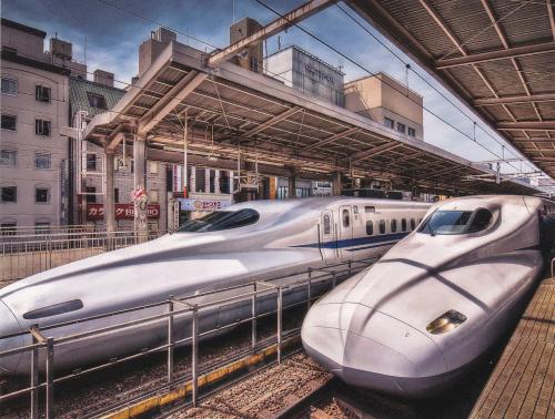 Japanese high speed trains at Kyoto station.