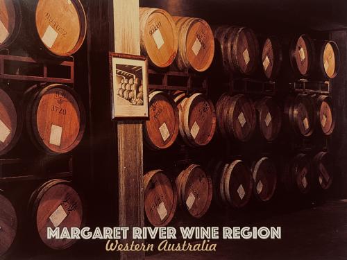 Wine Barrels in Wine Cellar. Vintage Style Toned Picture