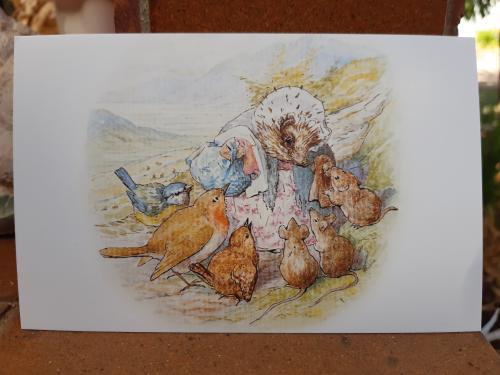 Painting of a family of birds, mother, baby and child