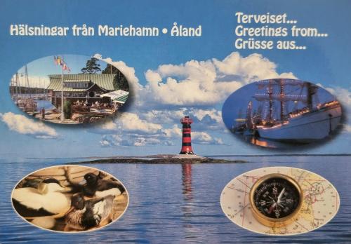 Vintage Travel Postage Stamp with lighthouse, ship and compass.