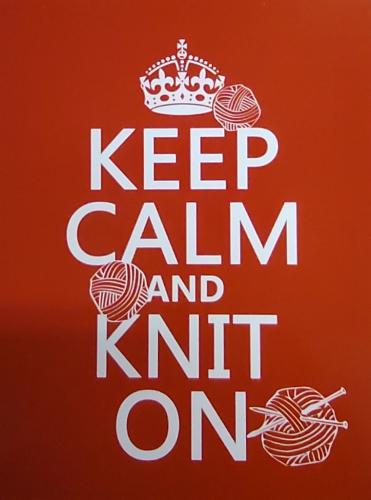 Keep calm and don't knit sign on a red background. Knitting needles and yarn.