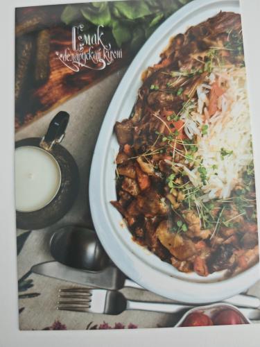 Delicious beef stroganoff with rice and vegetables in a restaurant