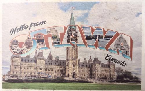 A postcard printed in Canada shows the Parliament building, Ottawa, circa 1980s