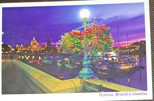 A postcard printed in Thailand shows a view of the Chao Phraya River, Bangkok, Thailand.