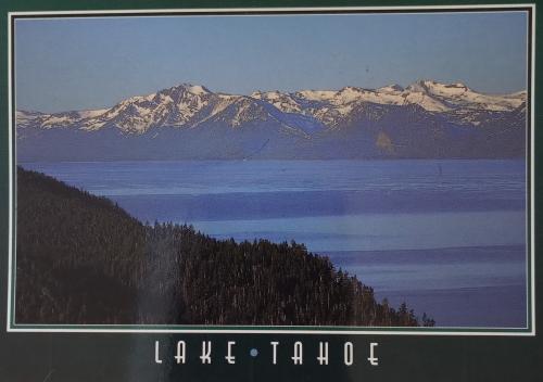 A postcard printed in the USA shows a view of Lake Tahoe.