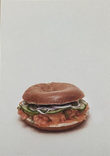 Sandwich with salmon and cucumber on a white background. Vintage style.
