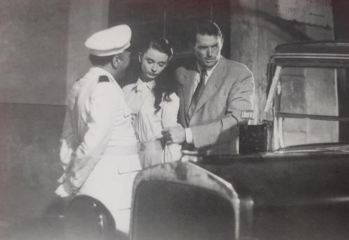 Couple in a vintage car. Photo in old image style.