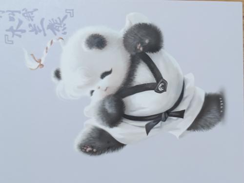 Panda paper art on the white background. Chinese calligraphy.