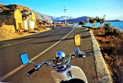 Motorcycle on the road in the desert of Crete, Greece