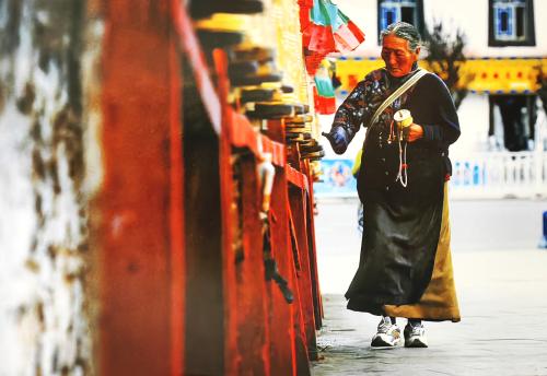 Unidentified old woman in traditional clothes in Hong Kong, China.