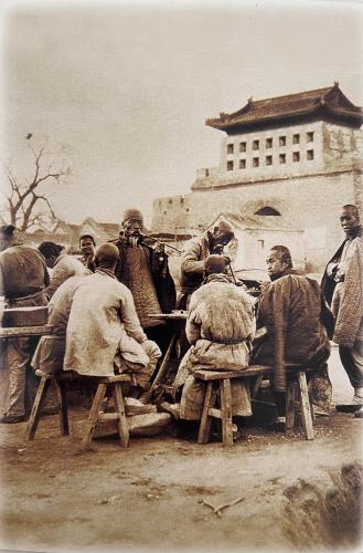 An antique photo shows a group of people in China circa 1910.