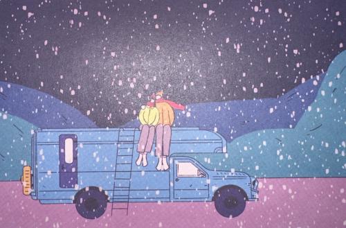 Man and woman sitting on the roof of a truck in the rain