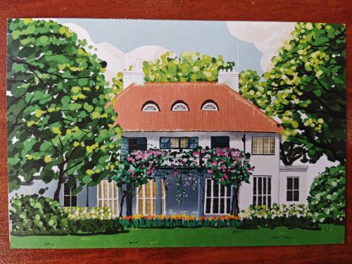 Colorful drawing on the wall of a house in the garden.