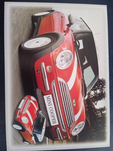 Red Mini Cooper. Mini Cooper was produced by the British automotive manufacturer Mattel.