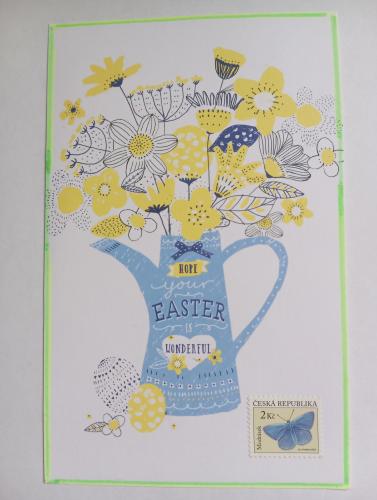 Handmade postcard with a picture of a watering can and flowers