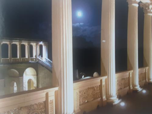 Beautiful view of the interior of a building with columns in the night