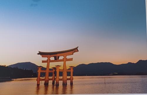 Beautiful japanese torii gate at kyoto lake