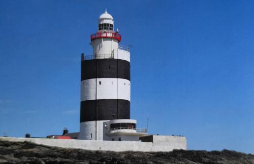 Lighthouse in the north of Portugal, with blue sky background.