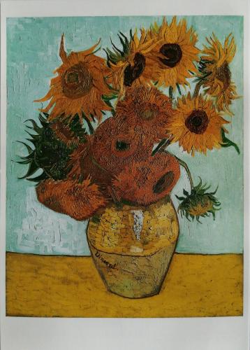 Painting of sunflowers in a vase on the wall