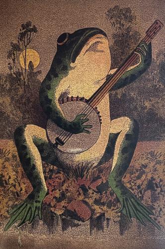 Frog playing the balalaika on the wall of the temple