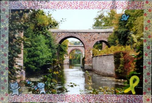 A view of a bridge over a canal in the city of York, England.