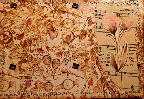 Old paper background with flowers and music notes. Close-up.