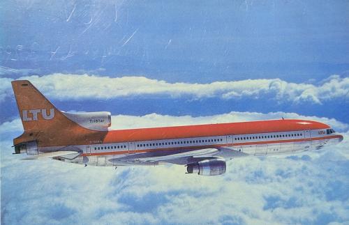 Airliner in the clouds. Photo in old color image style.