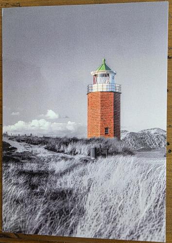 Picture of a lighthouse on the north coast of Iceland. Picture is created from a photo.