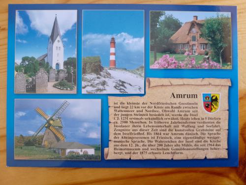 Vintage postcard with old windmill and windmill on the background