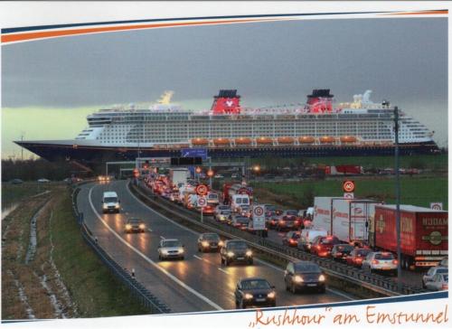 A large cruise ship on the highway in the Netherlands.