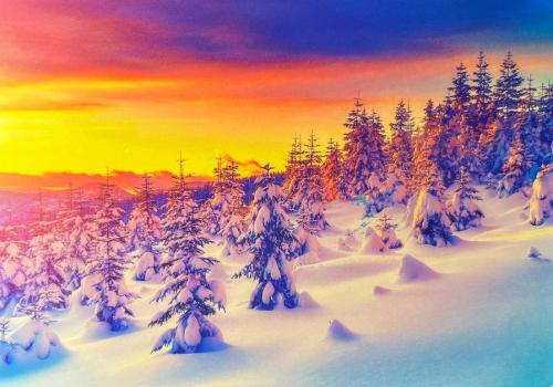 Beautiful winter landscape. Sunrise in the mountains. Christmas background.