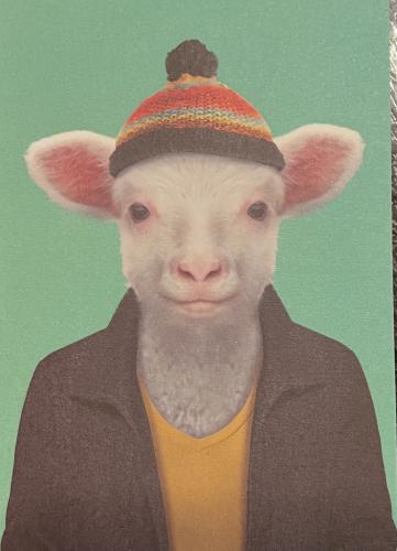 Cute lamb in a hat on a green background. Vintage style.