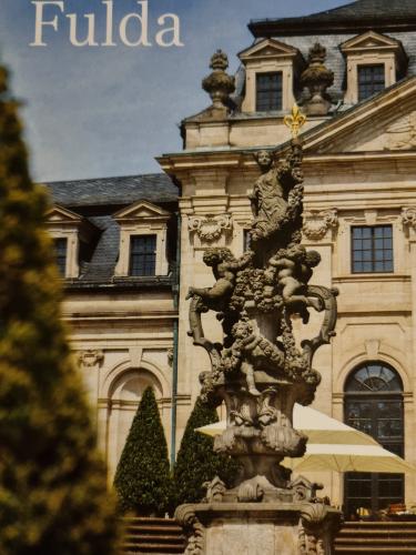 Sculpture in front of the entrance to the Royal Palace.