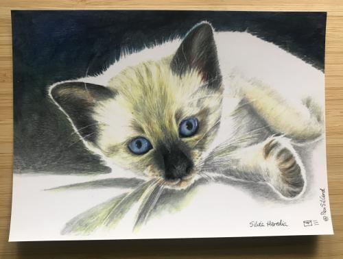 Kitten painting on canvas. Cute little kitten with blue eyes.