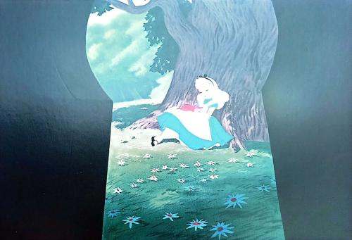 Wedding scene with the bride and groom in a tree.