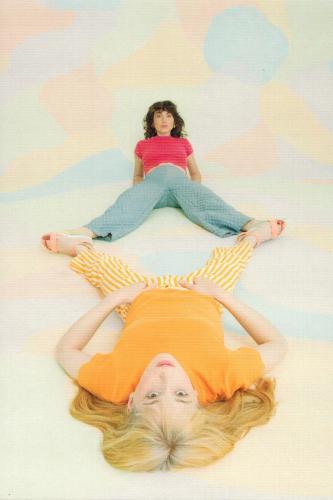Young woman lying on the floor. Photo in old color image style.