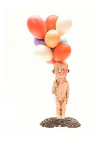 Plasticine man with balloons on a white background. Isolated
