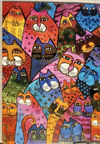 Colorful handmade paper cut of cats. Handmade paper crafts.
