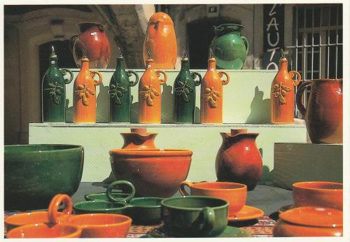 Vintage postcard with porcelain vases and pots.