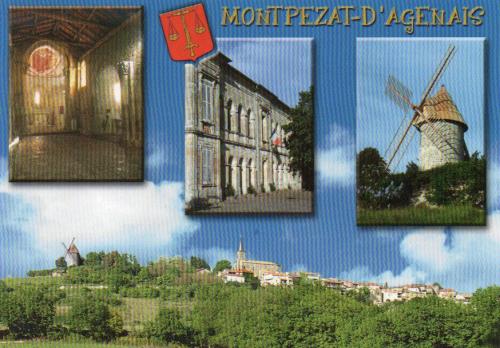 Lithuanian Landscape with buildings and windmills.
