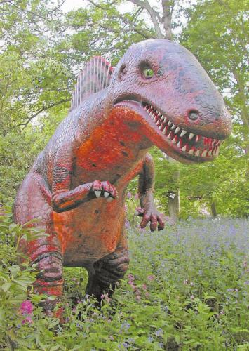 Dinosaur statue in a park in Wiltshire, England.