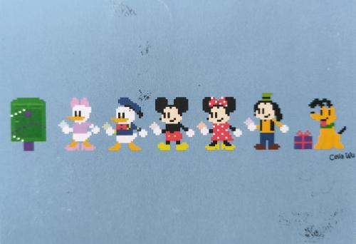 Funny pixel art of a group of children with gifts and a box