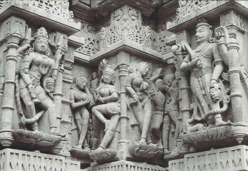 Carvings of Hindu gods on the wall of the temple.