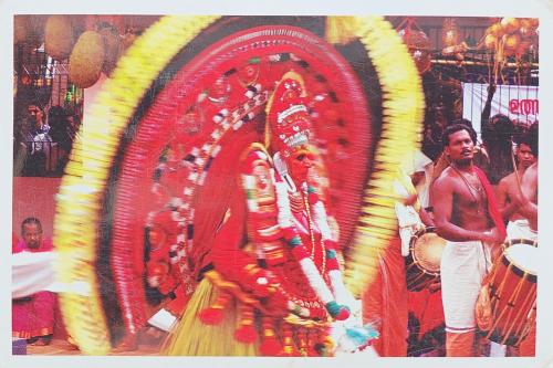 A postcard printed in Kolkata shows a group of Hindu devotees performing a religious dance during the Ganga Aarti festival.