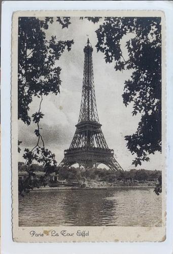 A stamp printed in Paris shows image of the Eiffel Tower, circa 1953