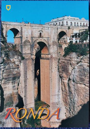 A postcard with the image of the bridge in Ronda, Spain.