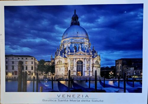 A postcard printed in Paris shows the Basilica of the Sacred Heart of Paris