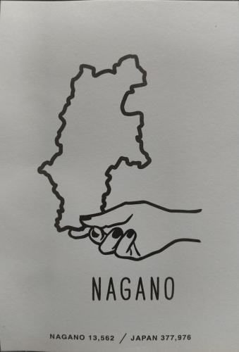 Hand holding map of Nagano