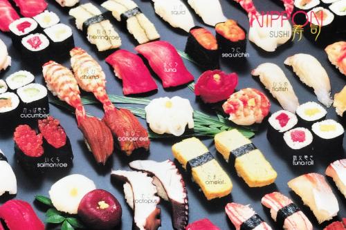 Japanese sushi set on black background. Sushi menu. Japanese food