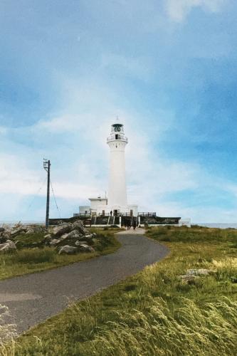 Lighthouse on the island of Cap Frehel in Brittany, France
